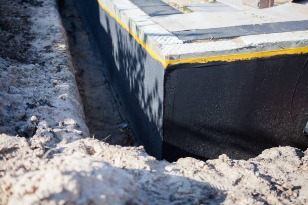 Professional Basement Waterproofing technician working in Clearwater, MN